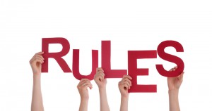 http://www.dreamstime.com/royalty-free-stock-photos-people-holding-rules-many-word-isolated-image38948498